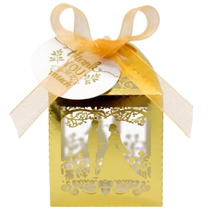 Laser cut gold wedding favor box with bride and groom silhouette and ribbon