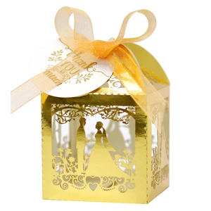 Golden laser-cut wedding favor box with bride and groom silhouette and thank you tag