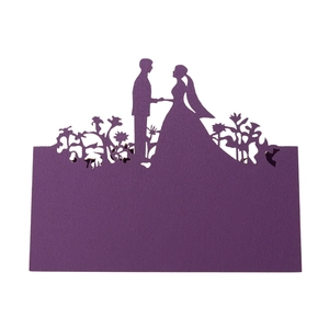 Detailed laser-cut purple wedding place card featuring a romantic couple silhouette