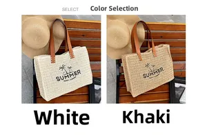 Detail of woven straw tote bags with palm tree embroidery and leather handles for summer