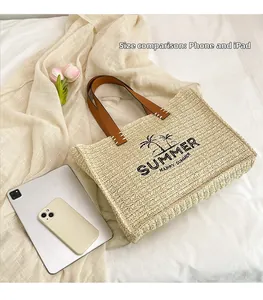 Detail view of woven summer tote size comparison with phone and iPad for scale