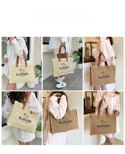 Detailed model views of large straw tote bag with Summer embroidery and leather handles