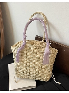 Woven bucket tote bag with purple chiffon wrapped handles and pearl decorations