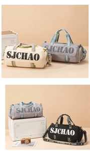 Detail view of large duffel bag colors in cream, gray, and black with side pockets