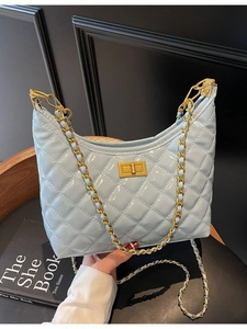 Light blue quilted hobo bag with gold chain strap and turn-lock closure for women