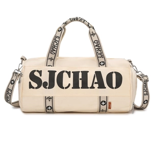 Off-white cylindrical fitness travel bag with black S.JCHAO logo and floral strap