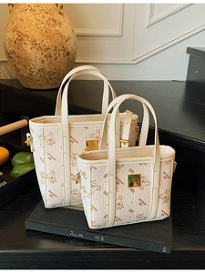 Cream luxury leather tote bag set with cute bear prints and gold logo branding