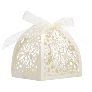 Detailed laser-cut floral pattern on a white pearlescent paper candy gift box with ribbon
