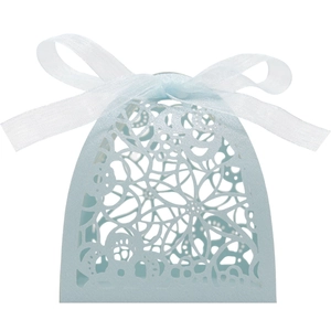 Detailed laser-cut floral pattern on light blue pearlescent paper favor box with ribbon