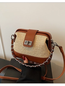 Straw and brown leather crossbody bag with silver chain strap and metal turn-lock