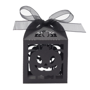 Halloween black hollow gift box with pumpkin and spider cutout designs and a black ribbon