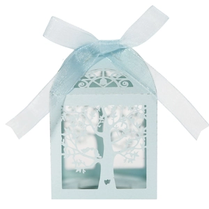 Detail of light blue laser-cut candy box with bird and tree motifs and silk ribbon