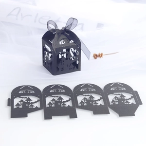 Black hollow Halloween castle candy gift box with spider web patterns and black ribbon bow
