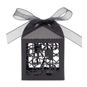 Elegant black hollowed GRAD graduation favor box with chic ribbon and laser-cut star details