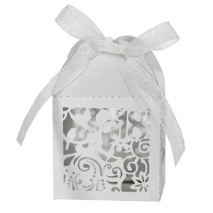 Detailed laser-cut white favor box with number 18 and elegant floral vine patterns