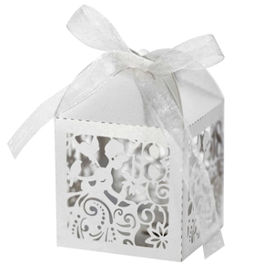 Detailed laser-cut white favor box showing number 18 and elegant floral hollow patterns