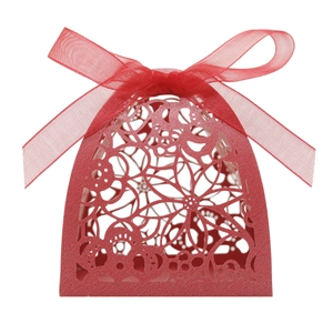 Detail of laser-cut floral pattern and organza ribbon on dark red wedding candy box