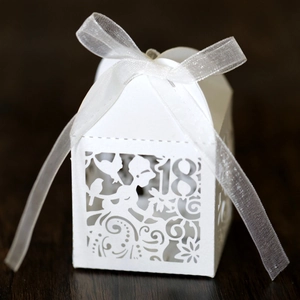 White laser-cut candy box with 18th birthday design and white organza ribbon