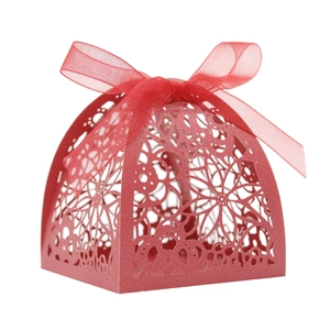 Elegant red laser cut floral wedding candy box with a decorative silk ribbon bow