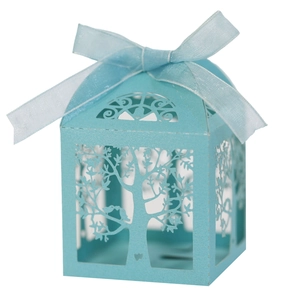 Light blue laser cut candy box with hollow tree design and matching organza ribbon