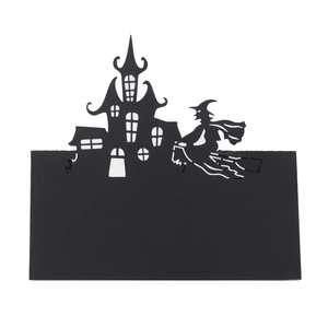 Halloween black hollow place card featuring witch and castle silhouettes for party decor