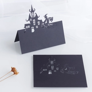 3D laser cut Halloween place card with black castle and witch silhouette for table setting
