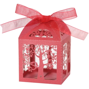 Red laser-cut hollow candy box with tree and bird patterns and a red ribbon bow