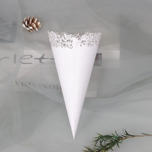 Laser-cut white paper cone with floral patterns for wedding petals and confetti