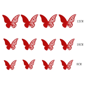 Set of 12 red hollow paper butterflies in 8cm, 10cm, and 12cm sizes for wall decor