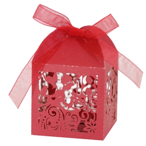 Laser cut red favor box with hollow floral patterns and sheer ribbon bow for birthdays