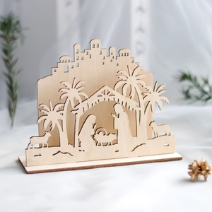 3D laser-cut wooden nativity scene featuring the Holy Family and palm trees ornaments