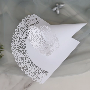 Elegant white laser-cut paper petal cones for wedding flower toss and party snacks