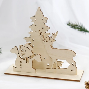 Laser-cut wooden Christmas reindeer, snowman, and tree figurines on a sturdy base stand