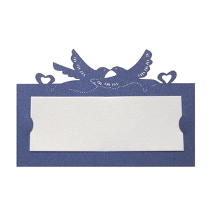 Detail of laser-cut navy blue place card featuring birds and heart with white insert