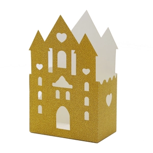 Elegant gold glitter castle candy box with intricate cutout design for wedding and party favor