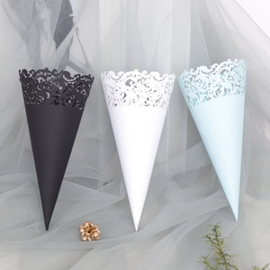 Detailed laser-cut hollow patterns on cones for wedding petals in black white and blue