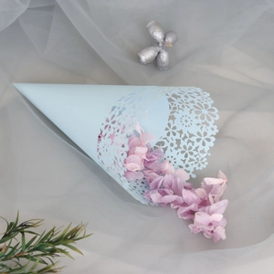 Elegant light blue paper cone with laser-cut floral lace and purple flower petals
