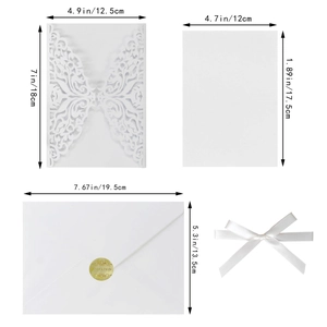 Detail of laser cut butterfly wedding invitation set with dimensions and envelopes