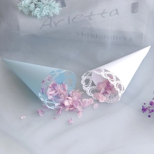 European hollow heart light blue wedding petal cones with laser cut lace details