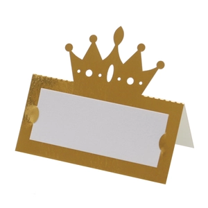 Detailed view of a gold hollow crown place card holder for wedding table setting