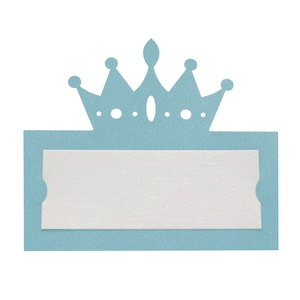 Macro detail of a light blue laser-cut crown place card with blank white insert for events