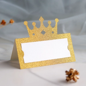 Glitter gold crown place cards for wedding tables with white name writing area