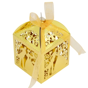 Detailed laser-cut gold wedding favor box featuring romantic bride and groom silhouette