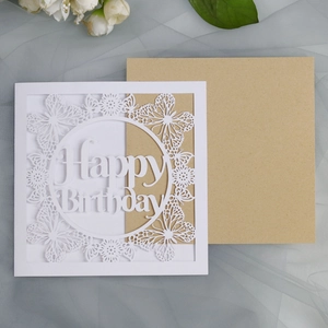 Detailed laser-cut Happy Birthday card with intricate butterfly patterns and kraft envelope