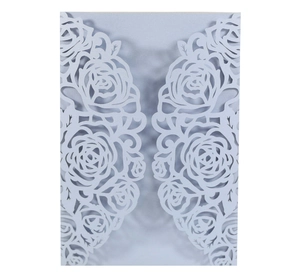Detailed laser-cut hollow rose pattern on pearlescent paper wedding invitation cover