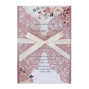 Elegant laser cut wedding invitation with pink glitter rose cover and silk ribbon bow
