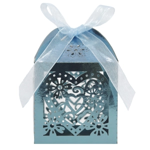 Detailed laser-cut heart pattern on light blue gift box with matching ribbon bow