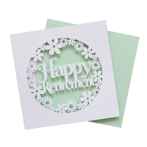 Detail of laser-cut Happy Retirement invitation card with delicate floral hollow design