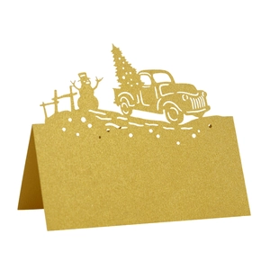Gold glitter 3D laser cut Christmas place card featuring snowman and truck with tree