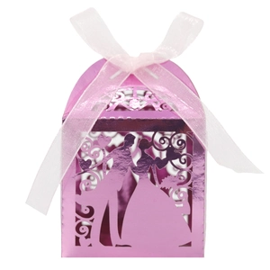 Detailed laser cut purple wedding candy box with bride and groom silhouette and pink ribbon